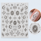 Sticker nail art 1230 – semilune, stele și șerpi argintii în relief, cu exemplu pe unghie