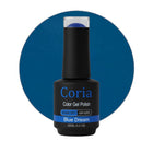 Ojă semipermanentă Coria Blue Dream 03, flacon 15 ml pe fundal albastru