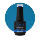 Ojă semipermanentă Coria Blue Dream 08, flacon 15 ml pe fundal albastru