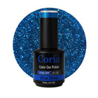 Ojă semipermanentă Coria Blue Glow 23 – albastru sclipitor, flacon 15 ml
