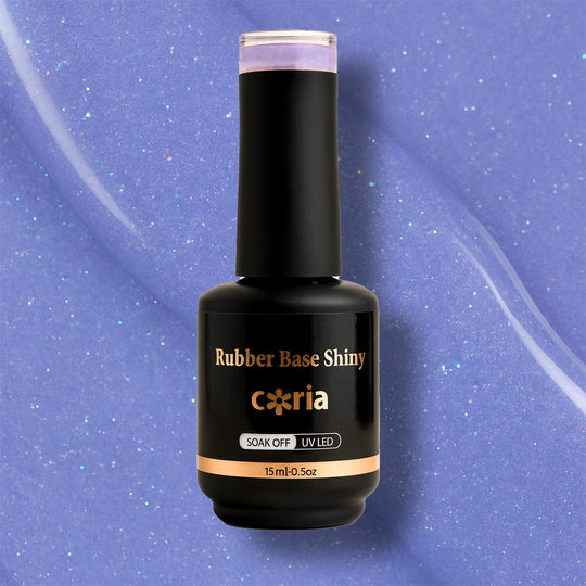Baza Rubber Shiny Coria 043, flacon 15 ml pe fundal lila-albastru sclipitor