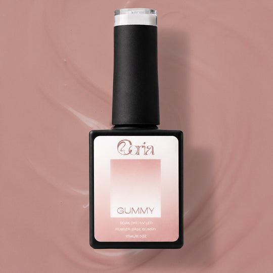 Baza Rubber Gummy Nude 138 Coria, flacon 15 ml pe fundal maro-roz