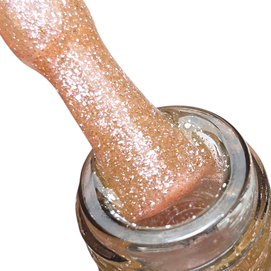 Baza Rubber Moonlit Halo 004 Coria – piersică cu sclipici pe pensulă