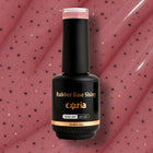 Baza Rubber Shiny 107 Coria, flacon 15 ml pe fundal roz cu buline negre