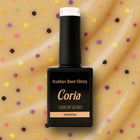 Baza Rubber Shiny Coria 572023, flacon 15 ml pe fundal crem cu buline colorate