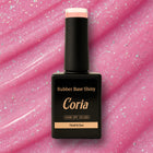 Baza Rubber Shiny Coria 842023, flacon 15 ml pe fundal roz sclipitor