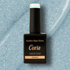 Baza Rubber Shiny Coria 902023, flacon 15 ml pe fundal bleu sclipitor
