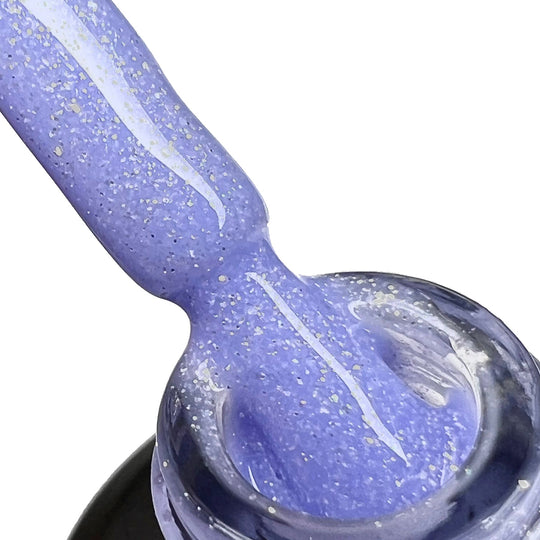 Baza Rubber Shiny Coria 043 – lila-albastru cu sclipici pe pensulă