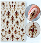 Sticker nail art 389 Elite – bijuterii aurii cu pietre vișinii, cu exemplu pe unghie