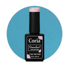 Ojă semipermanentă Coria Dreamland 010, flacon 15 ml pe fundal albastru