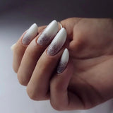 Builder Gel Milky White Level 1 – unghii migdală albe lăptoase, cu ombré argintiu sclipitor